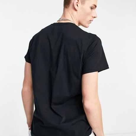 Religion logo pocket t-shirt in black
