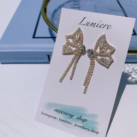 asymmetry butterfly tassel pierce
