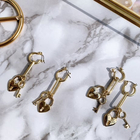 gold heart key pierce