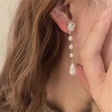 square stone × pearl long pierce