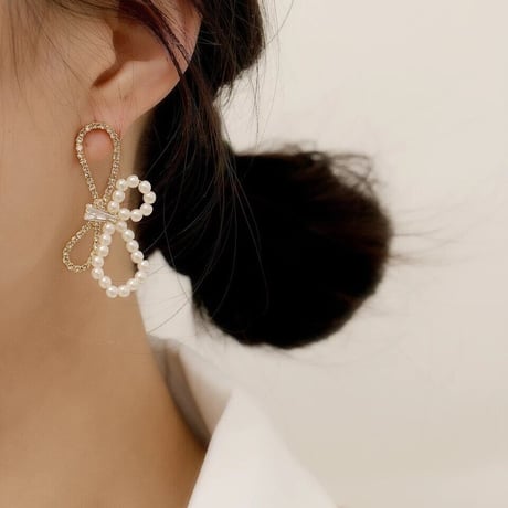 stone × pearl ribbon  pierce