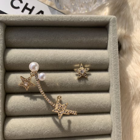 star × pearl asymmetry pierce
