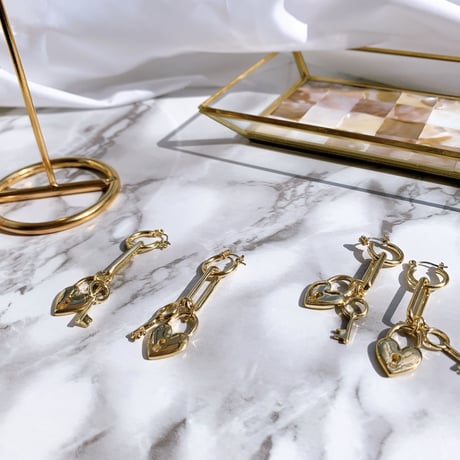 gold heart key pierce