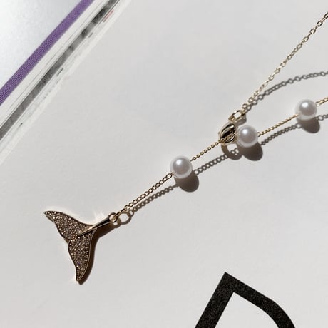 tail × pearl necklace