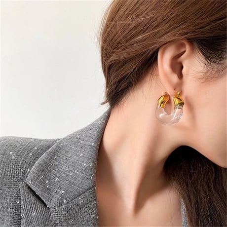 clear × gold hoop pierce