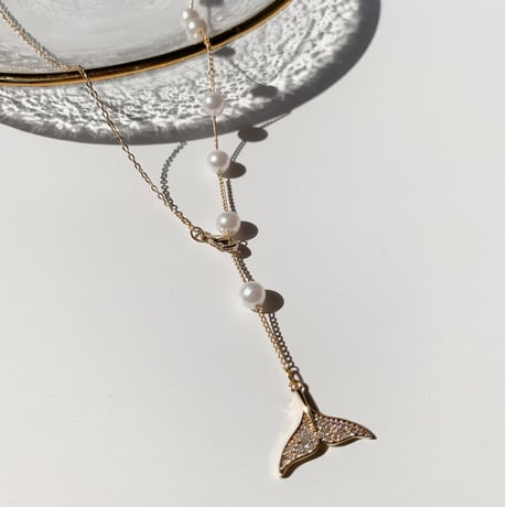 tail × pearl necklace