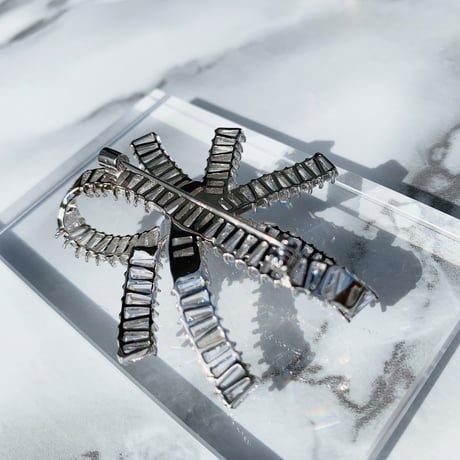 solid cord  brooch