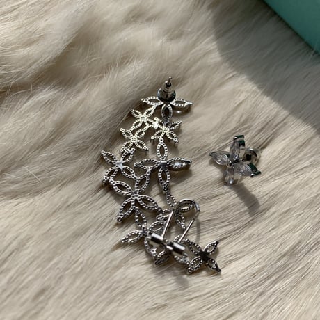 flower ear asymmetry pierce