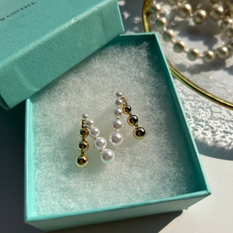 pearl × gold bowl pierce