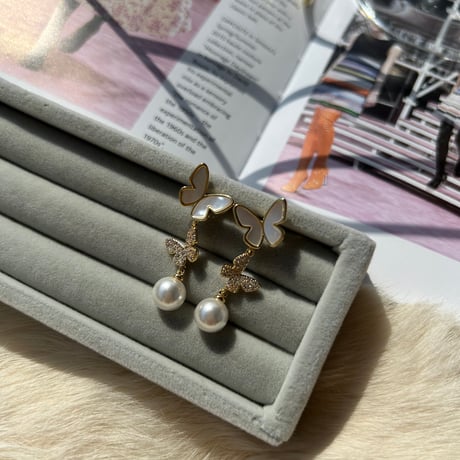 double butterfly × pearl pierce