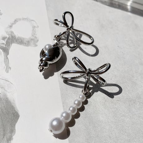 shell  pearl asymmetry pierce