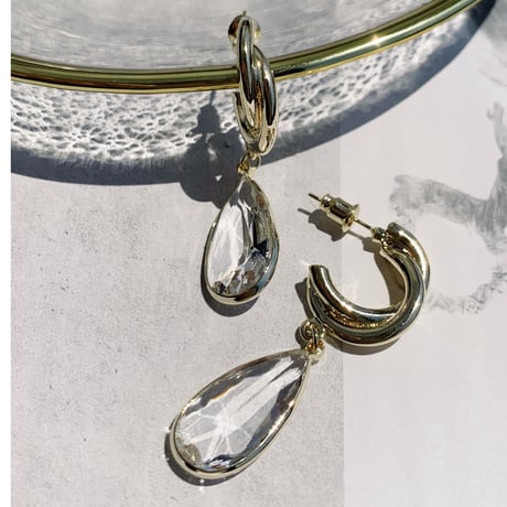 gold hoop × clear drop pierce