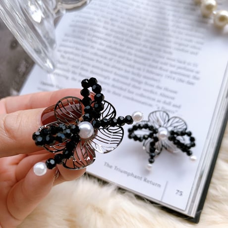 black flower × ribbon pierce