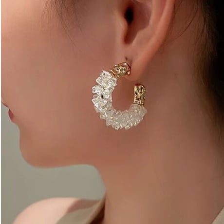 clear × gold hoop pierce