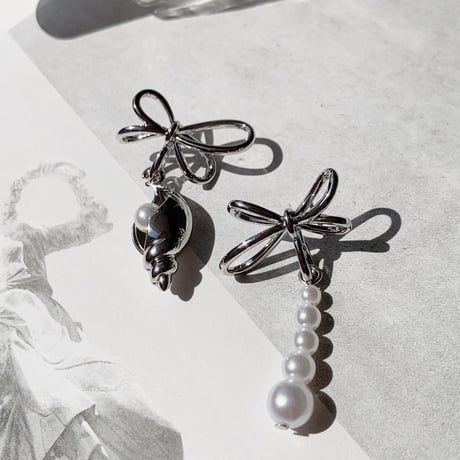 shell  pearl asymmetry pierce