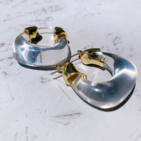 clear × gold hoop pierce
