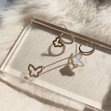 butterfly shell × stone asymmetry pierce