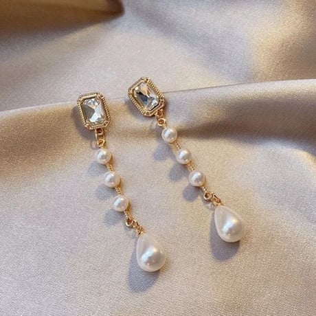 square stone × pearl long pierce