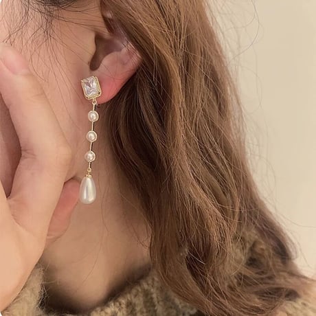 square stone × pearl long pierce