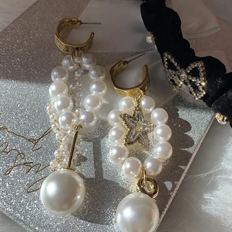 pearl × star asymmetry pierce