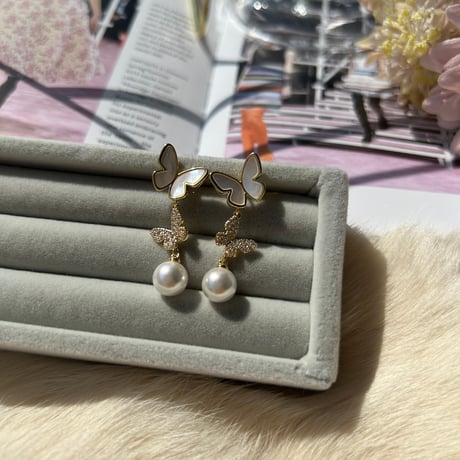double butterfly × pearl pierce