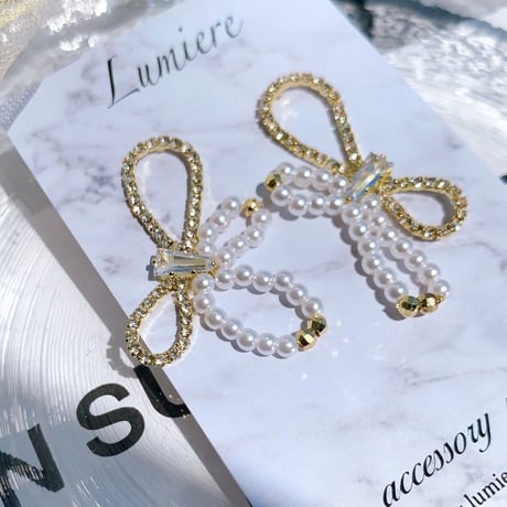 stone × pearl ribbon  pierce