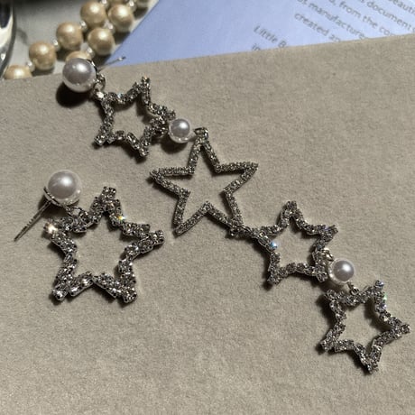 star × pearl asymmetry pierce