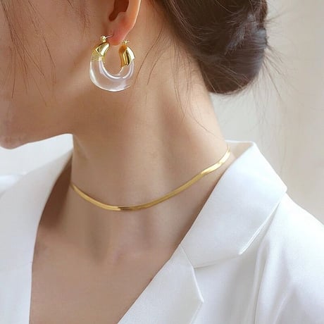 clear × gold hoop pierce