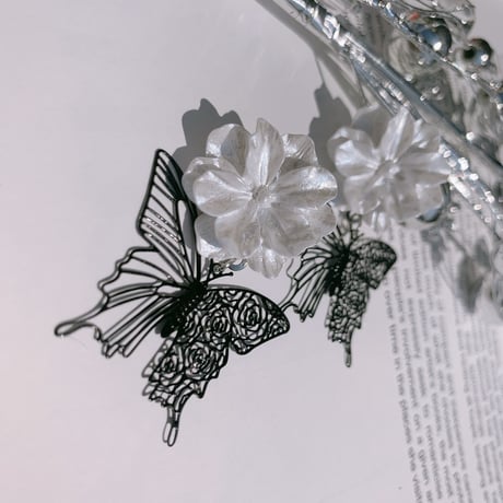 black butterfly × flower  pierce