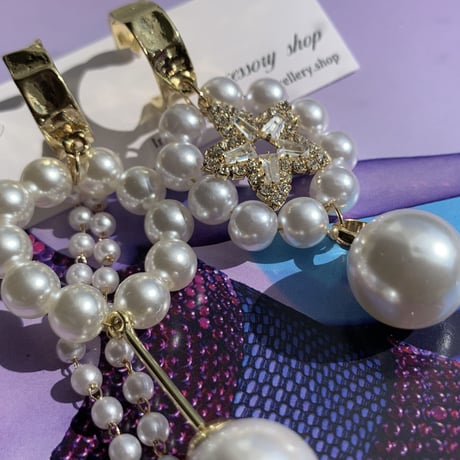 pearl × star asymmetry pierce