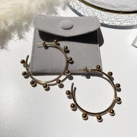 simple gold bowl big hoop pierce