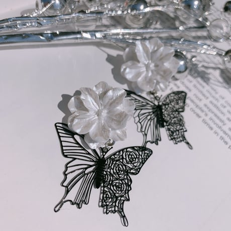 black butterfly × flower  pierce