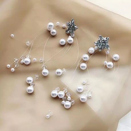 star pearl × clear stone pierce