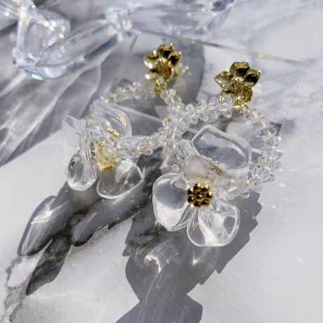 clear × metal flower loop pierce
