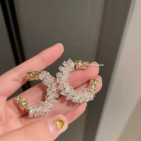 clear × gold hoop pierce