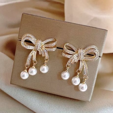ribbon × three pearl pierce