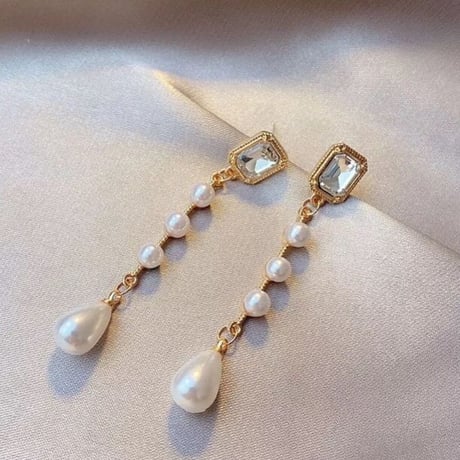 square stone × pearl long pierce