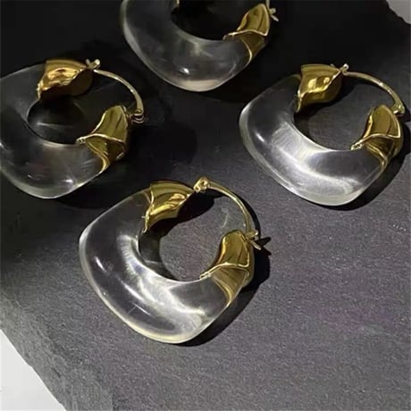 clear × gold hoop pierce