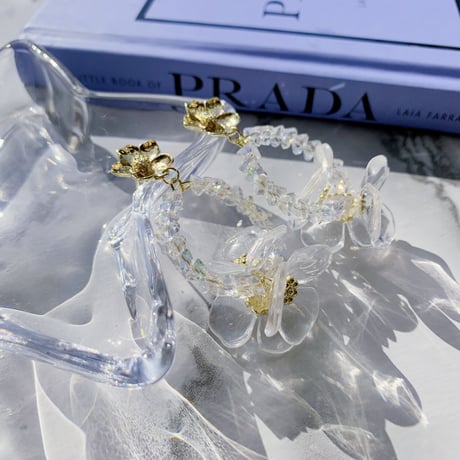 clear × metal flower loop pierce