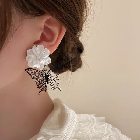 black butterfly × flower  pierce