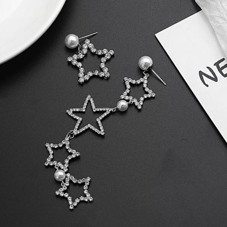 star × pearl asymmetry pierce