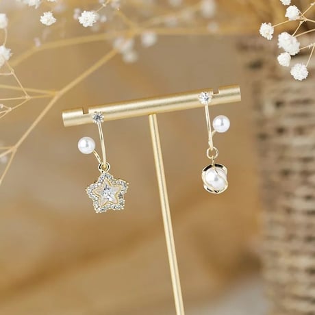 star × pearl asymmetry pierce