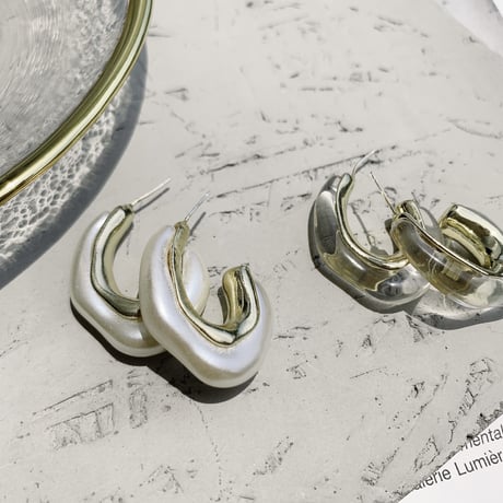 clear × gold hoop pierce