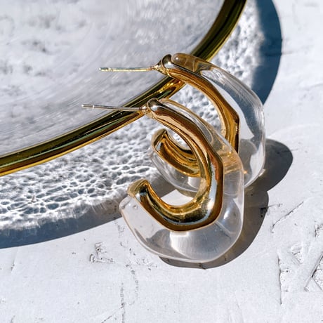 clear × gold hoop pierce