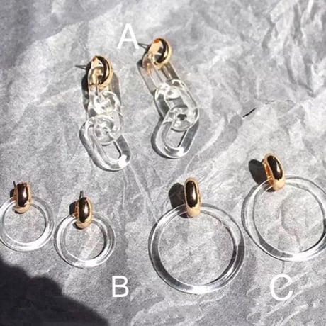 clear × gold pierce