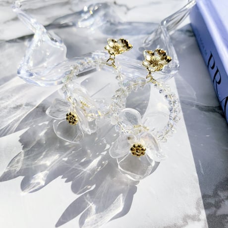 clear × metal flower loop pierce