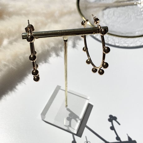 simple gold bowl big hoop pierce
