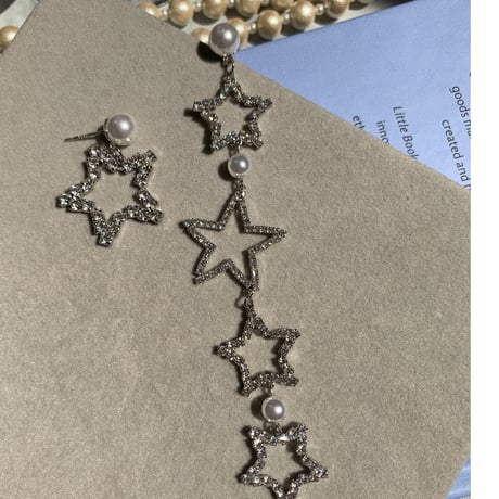 star × pearl asymmetry pierce