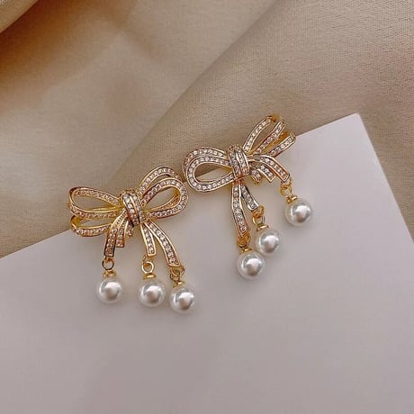 ribbon × three pearl pierce