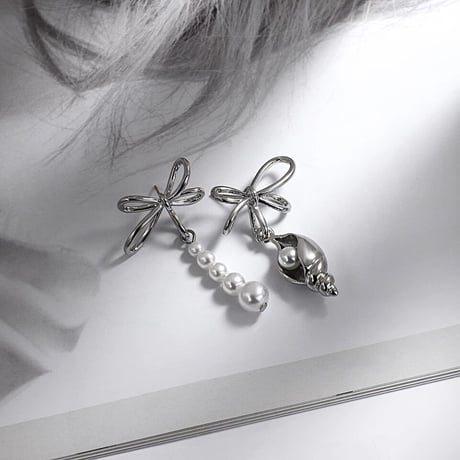 shell  pearl asymmetry pierce